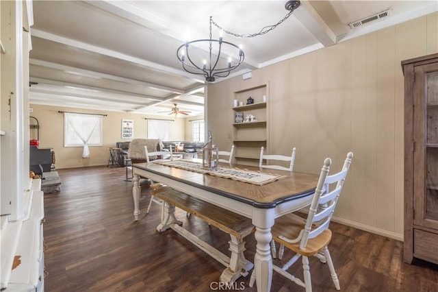 dining room featuring baseboards, visible vents, dark wood-style floors, beamed ceiling, and ceiling fan with notable chandelier