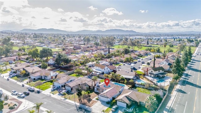 bird's eye view with a residential view and a mountain view