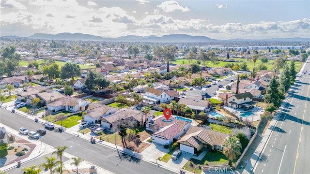 bird's eye view with a residential view and a mountain view