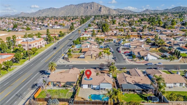 birds eye view of property featuring a residential view and a mountain view