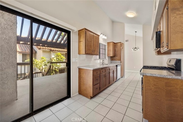 kitchen with light tile patterned floors, tasteful backsplash, brown cabinetry, and stainless steel dishwasher