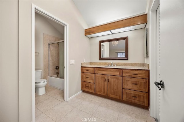 full bath with baseboards, toilet, tile patterned floors, bathtub / shower combination, and vanity