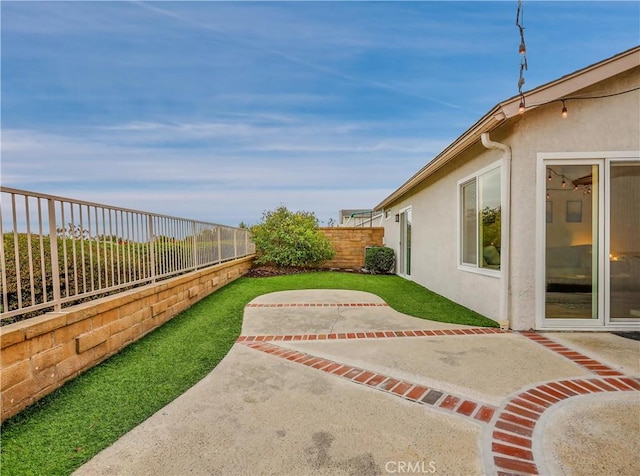 view of yard with a patio and a fenced backyard