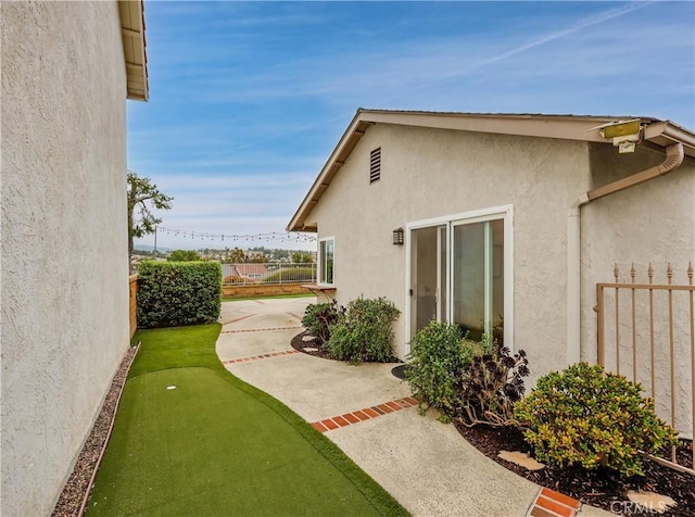 view of yard with a patio area and fence