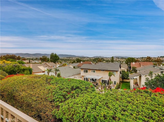 exterior space featuring a residential view and a mountain view