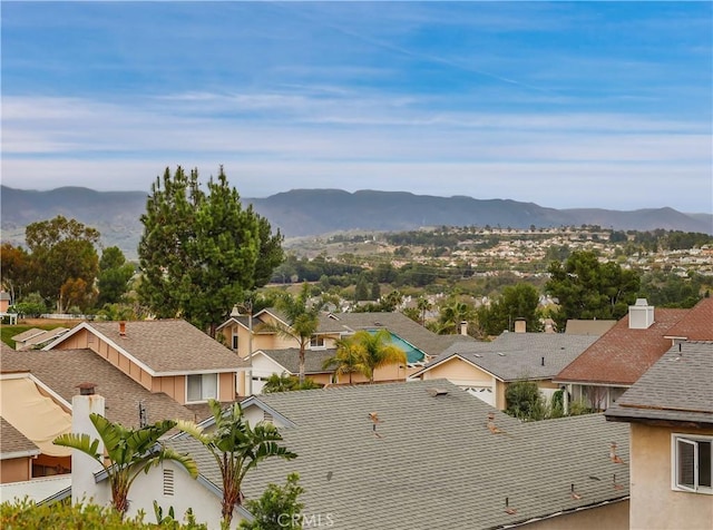 property view of mountains featuring a residential view