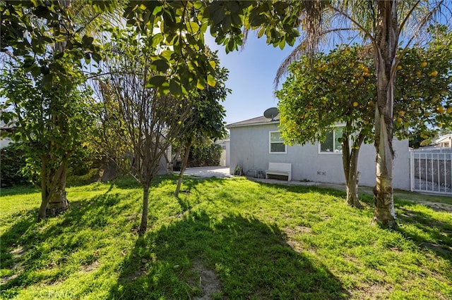 view of yard featuring a patio area and fence