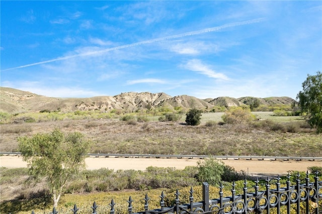 property view of mountains featuring a rural view