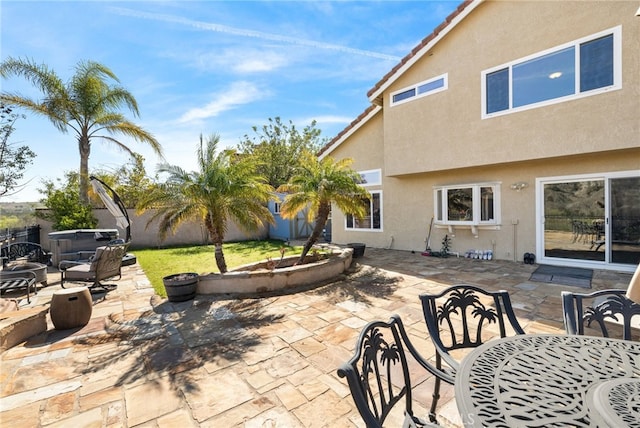 view of patio / terrace with a fenced backyard and outdoor dining space