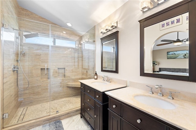 bathroom featuring a shower stall and a sink