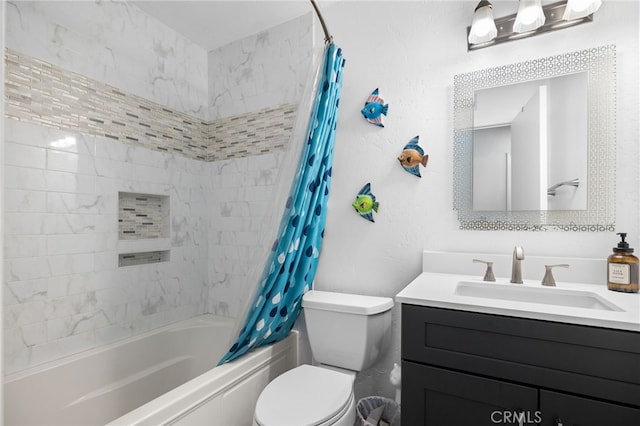 full bath with vanity, shower / tub combo, toilet, and a textured wall