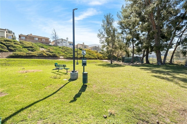 view of community featuring a yard