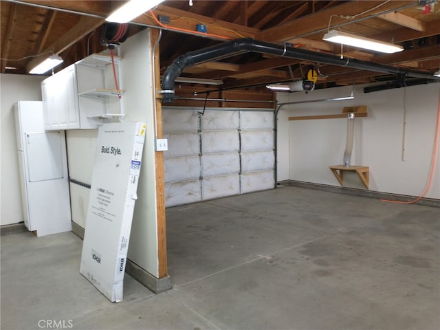 garage featuring freestanding refrigerator