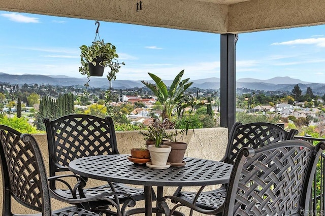 balcony featuring a mountain view