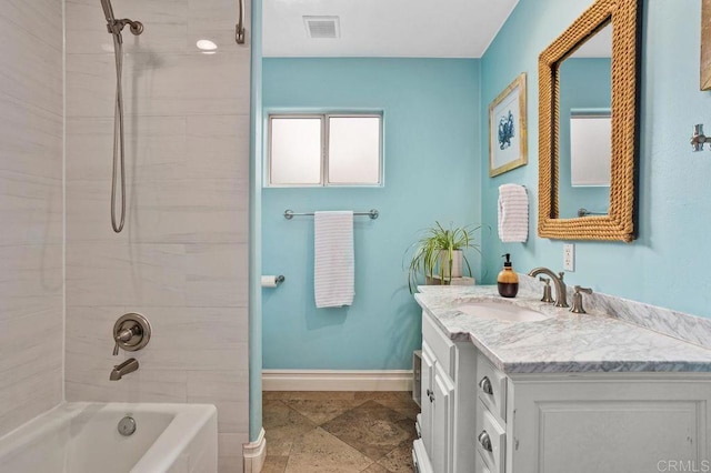 full bath featuring shower / bath combination, baseboards, visible vents, and vanity