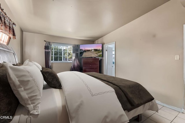 bedroom featuring tile patterned floors