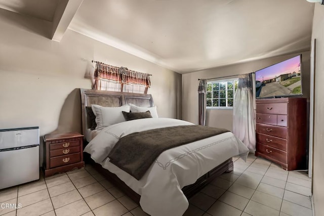 bedroom featuring light tile patterned flooring