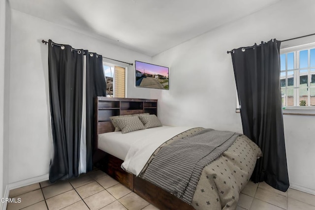 bedroom with tile patterned floors