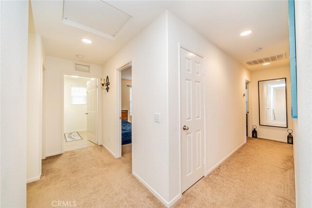 10916 Marygold, Corona, CA 92883 - hall with recessed lighting, light colored carpet, visible vents, baseboards, and attic access