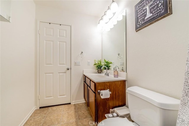 10916 Marygold, Corona, CA 92883 - bathroom with tile patterned flooring, vanity, toilet, and baseboards