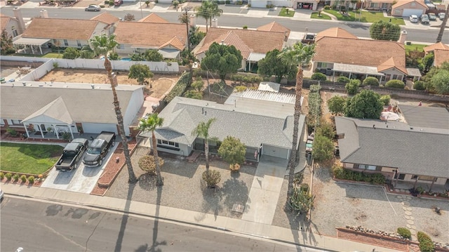 birds eye view of property with a residential view