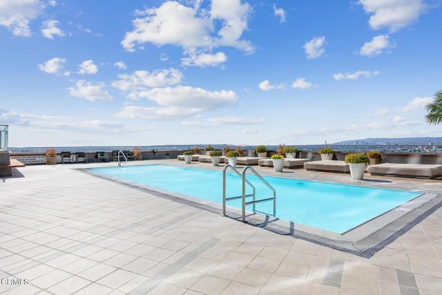 community pool with a patio