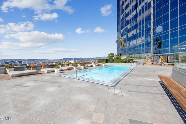 pool with a patio