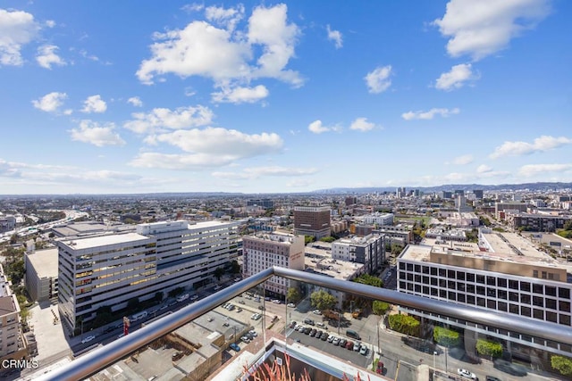 birds eye view of property featuring a city view