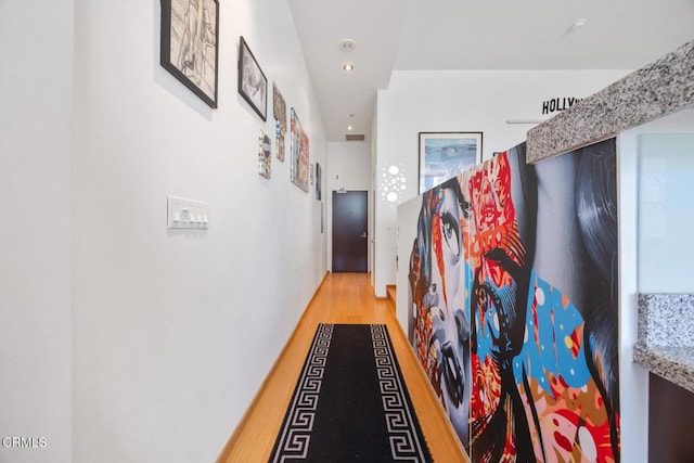 1100 Wilshire Blvd Unit 1808, Los Angeles, CA 90017 - hall featuring light wood finished floors and recessed lighting