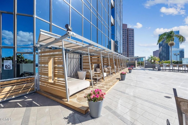 1100 Wilshire Blvd Unit 1808, Los Angeles, CA 90017 - view of patio featuring a city view