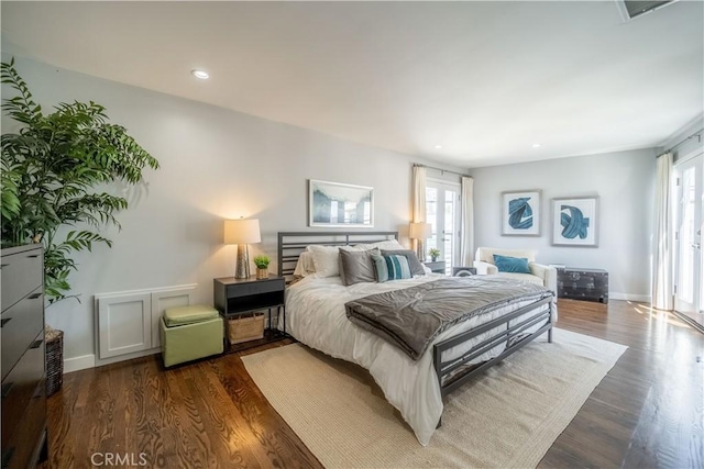 bedroom with french doors, recessed lighting, visible vents, wood finished floors, and baseboards