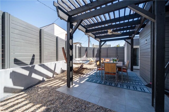 260 The Toledo, Long Beach, CA 90803 - view of patio / terrace with outdoor dining space, a pergola, and a fenced backyard