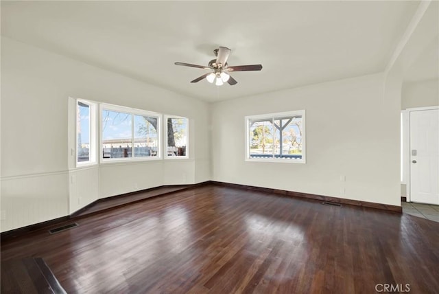 1495 S S, Corning, CA 96021 - unfurnished room featuring a wealth of natural light, visible vents, and wood finished floors