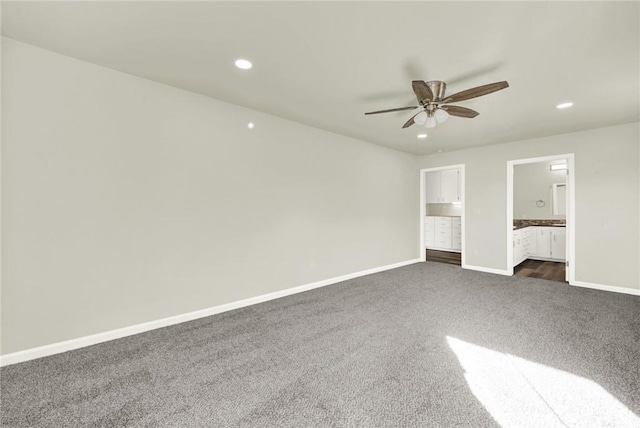 1495 S S, Corning, CA 96021 - unfurnished bedroom with ensuite bathroom, recessed lighting, dark colored carpet, baseboards, and ceiling fan
