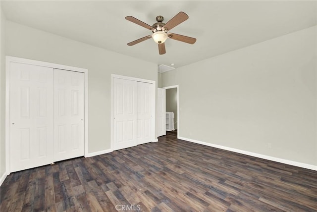1495 S S, Corning, CA 96021 - unfurnished bedroom with baseboards, multiple closets, dark wood finished floors, and a ceiling fan
