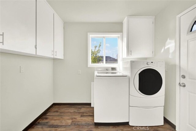 1495 S S, Corning, CA 96021 - laundry room with dark wood finished floors, cabinet space, separate washer and dryer, and baseboards