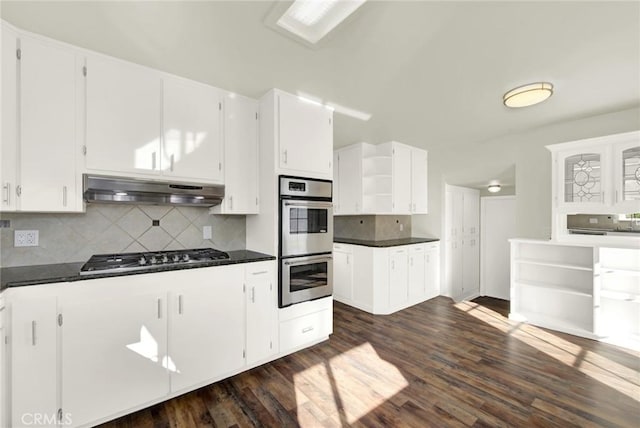 1495 S S, Corning, CA 96021 - kitchen featuring under cabinet range hood, appliances with stainless steel finishes, dark countertops, and open shelves