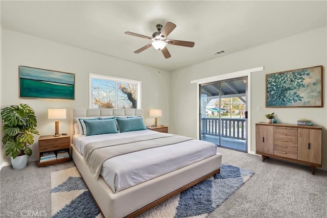 1495 S S, Corning, CA 96021 - bedroom featuring visible vents, light carpet, a ceiling fan, baseboards, and access to exterior