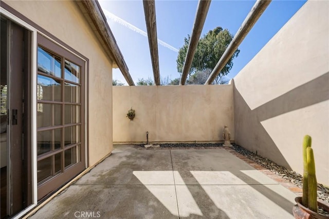 view of patio / terrace with fence