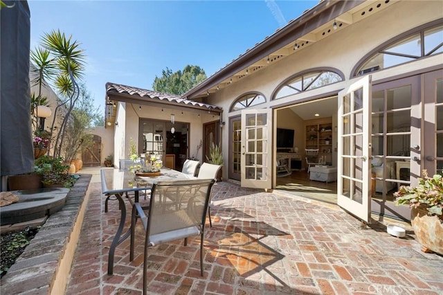 view of patio / terrace with french doors and outdoor dining space