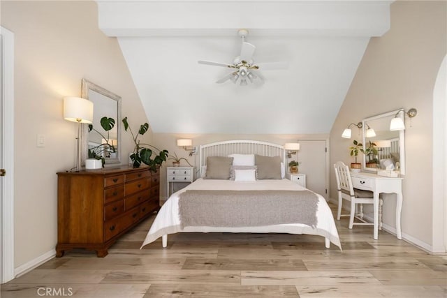 bedroom with vaulted ceiling, light wood finished floors, a ceiling fan, and baseboards