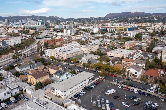 drone / aerial view with a view of city and a mountain view