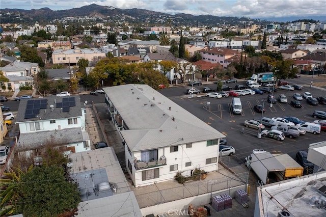 drone / aerial view with a residential view and a mountain view