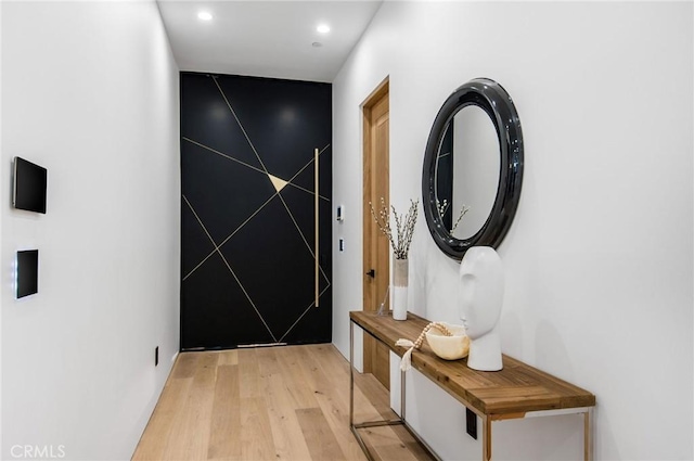 interior space with recessed lighting and light wood-style floors