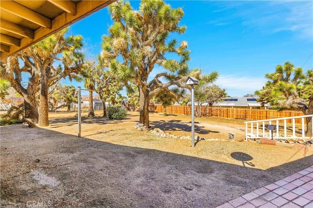 view of yard featuring fence