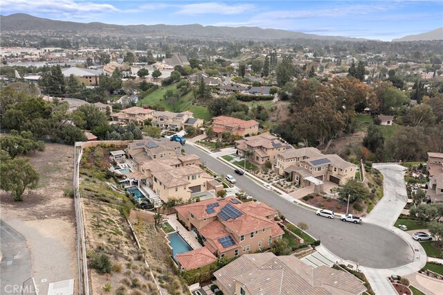 bird's eye view featuring a mountain view and a residential view