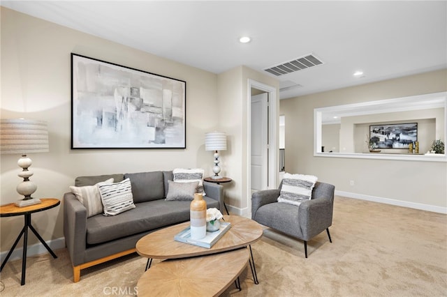 living room featuring recessed lighting, baseboards, visible vents, and carpet floors