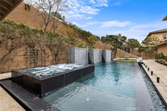 view of pool with a fenced in pool and a fenced backyard