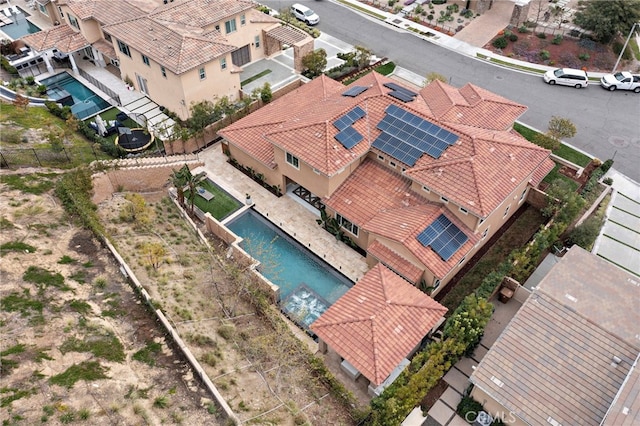 birds eye view of property with a residential view