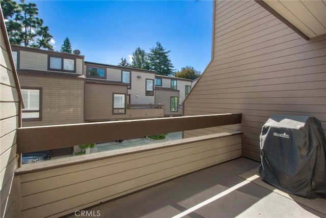 view of patio with a balcony and area for grilling